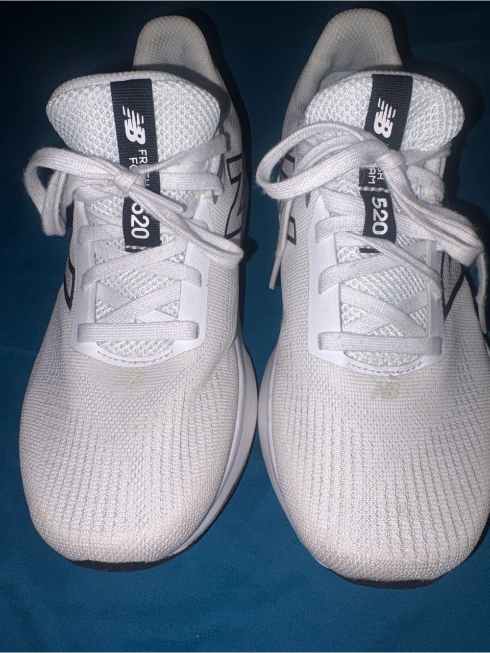 New Balance women’s 520 Athletic Sneakers in White with Black Accents